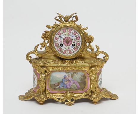 French gilt ormolu and Sevres porcelain mantel clock, having a Rose Pompadour and floral decorated dial with gilded Arabic nu