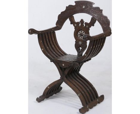 Egyptian carved and mother of pearl inlaid cross frame armchair in the Savonarola style, late 19th or early 20th Century, tra