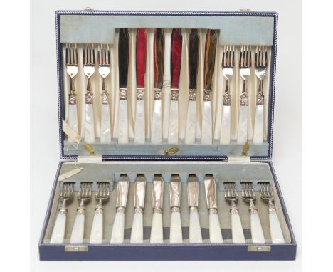 Modern silver and mother of pearl fish knives and forks, maker S.S, Sheffield 1966, twelve place settings, in original presen