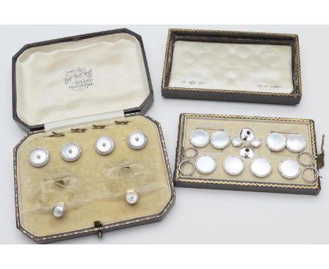 9ct white gold and mother of pearl cufflink and shirt stud set, boxed; also a box of 9ct two colour gold and mother of pearl 