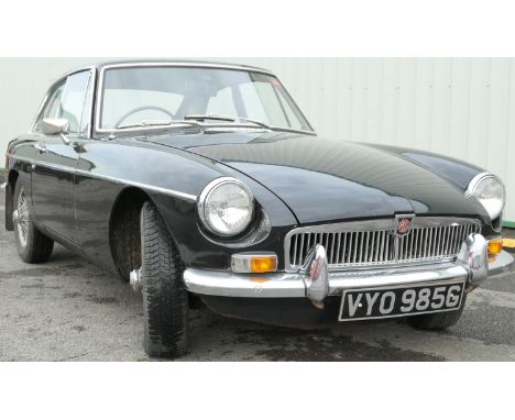 MGB GT Coupe, registration number VYO 985G (first registered 1969).  Finished in black with chrome trim and wire wheels, petr