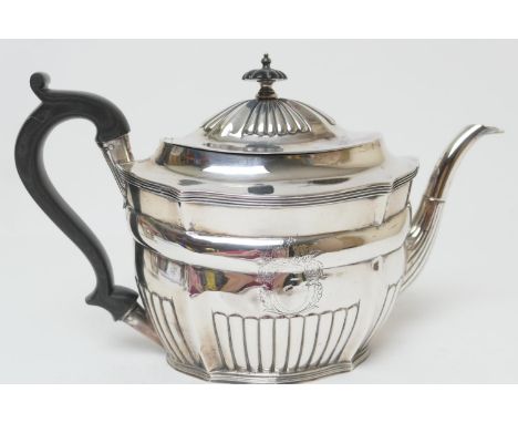 George III silver teapot, maker's mark indistinct, London 1800, of half reeded form with ebony finial and handle, height 17.5