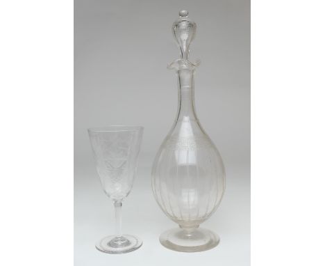 Fine late Victorian or Edwardian engraved wine glass, circa 1900, decorated with a basket of fruit suspended from holly, 18cm