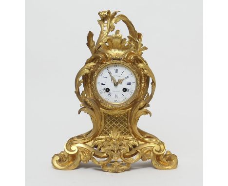 French gilt ormolu mantel clock, by Japy Fils, in Rococo Revival style, with scrolling acanthus enclosing a white enamel dial