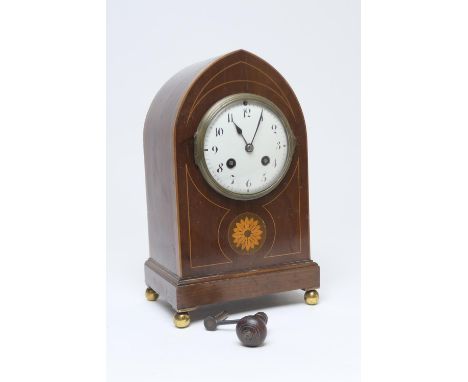 Edwardian mahogany and inlaid mantel clock, circa 1900, lancet shaped case with white enamel dial with Arabic numerals, the F
