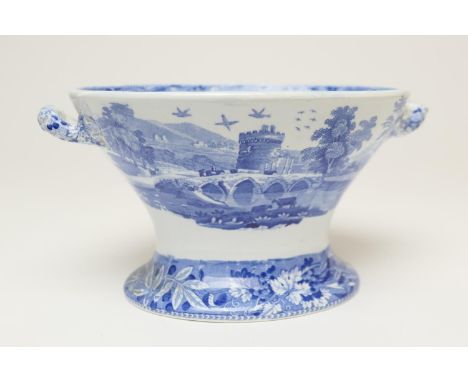 Spode blue and white Printware egg cruet, circa 1820, decorated with a blue and white printed British view to the twin handle