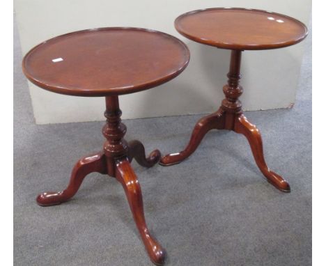 A pair of reproduction mahogany tripod tables, 53cm high x 43cm diameter  