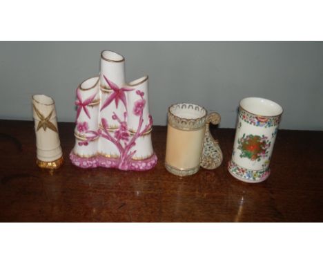 Four various Worcester vases, the tallest modelled as three cut stems of bamboo, 16cm high (4)  