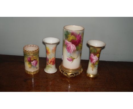 Four various Royal Worcester vases painted with pink roses and other flowers, the tallest dated 1917 and 16cm high (4)  