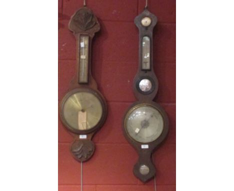An oak cased wheel barometer and two others  