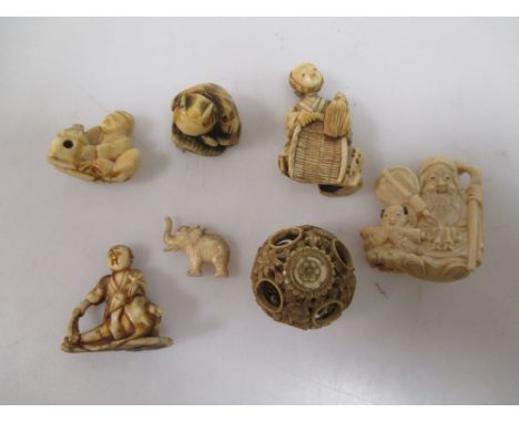 A collection of netsuke and other ivory (7)  