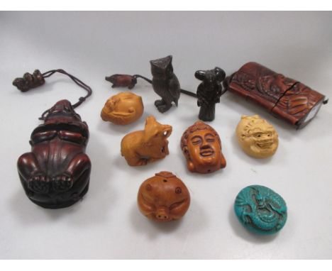 A Japanese wood lacquer netsuke and other carvings  