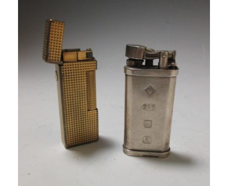 A silver Dunhill lighter, London 1999 and another Dunhill lighter (2)  