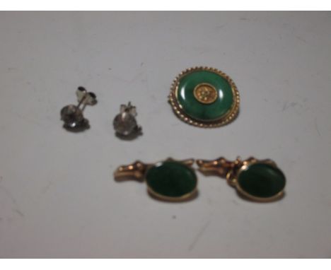 A pair of jade cufflinks stamped 14k to one end, together with a Chinese and yellow metal brooch and a pair of 19th century p