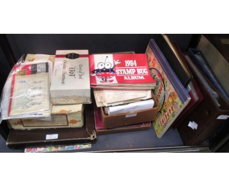 Various stamp albums containing Commonwealth & Foreign interest together with some cigarette cards  