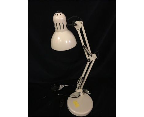 A cream angle poise desk lamp 