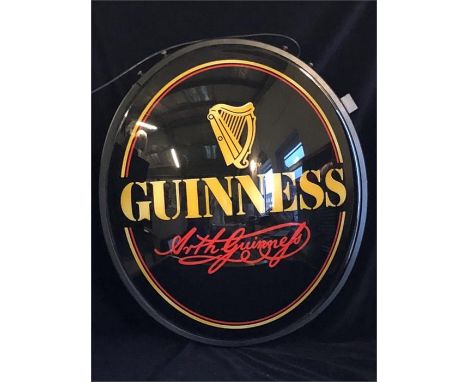 A large illuminated Guinness pub sign with swing bracket, taken out of box for photo.
