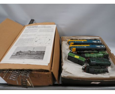 A quantity of assorted model railway engines and accessories