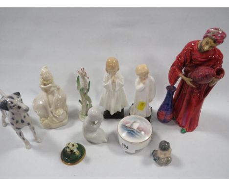 A selection of assorted figurines and ceramics to include Belleek, Royal Copenhagen, Royal Worcester and Royal Doulton etc