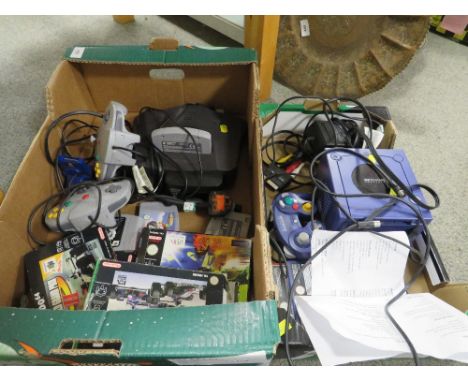 A Nintendo 64 games console, games and accessories (unchecked) together with a Nintendo gamecube etc