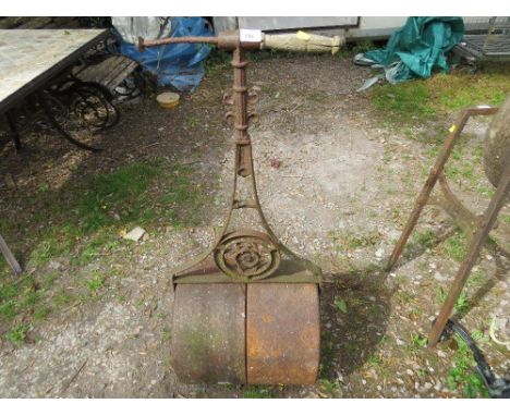 An antique garden roller