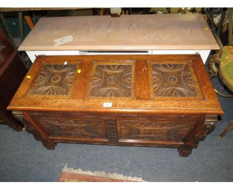A vintage carved oak blanket chest - W 99 cm