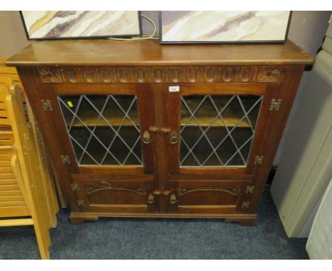 A vintage oak cased bookcase
