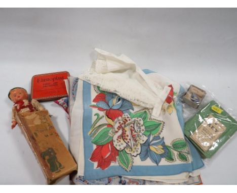 A small tray of collectables to include a small vintage clockwork Tyroleon dancing doll with key, British book safe etc