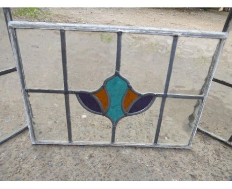 Four coloured leaded light windows