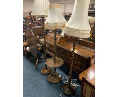 Two vintage oak barley twist standard lamps together with a bobbin twist example (3)