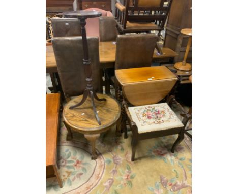 An oak barley twist dropleaf table, mahogany piano stool, oak table and a plant stand (4)