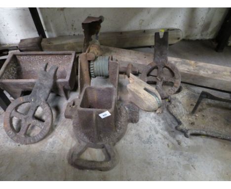 An antique tennis court net post and winder together with feeder trough, boot scraper etc