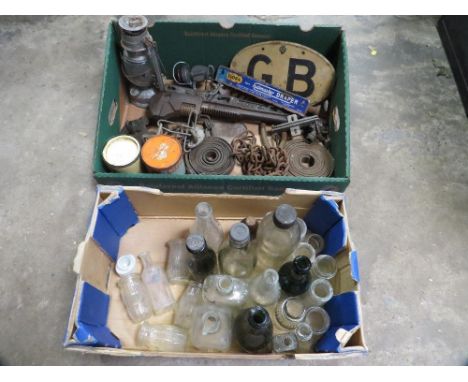 Two trays of sundries to include glass bottles and tools etc