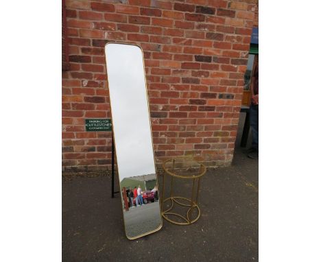 A modern gilt framed full length free standing mirror together with a gilt metal / glass topped circular lamp table (2)