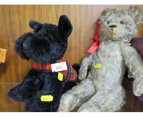 A vintage hump back teddy bear together with a modern scotty dog (2)