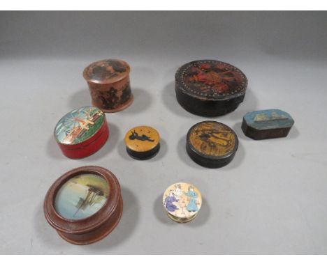 A small tray containing 8 vintage decorative pill and snuff boxes
