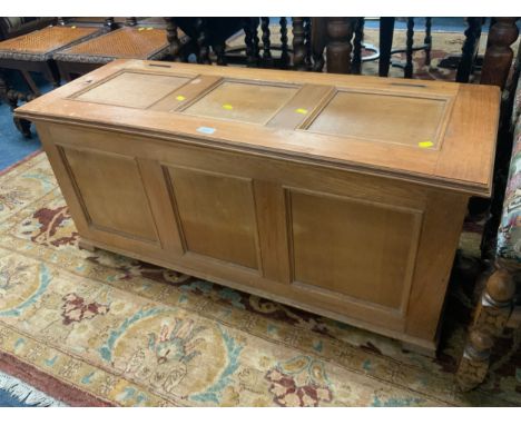 A light oak panelled coffer W 111 cm