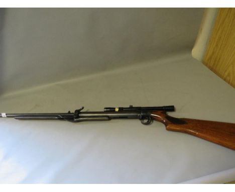 A vintage BSA top loader air riffle with later BSA 4 X 20 edition scope
