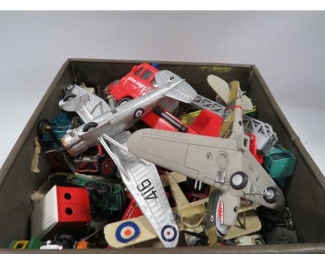A tin of vintage Dinky toy car, planes etc