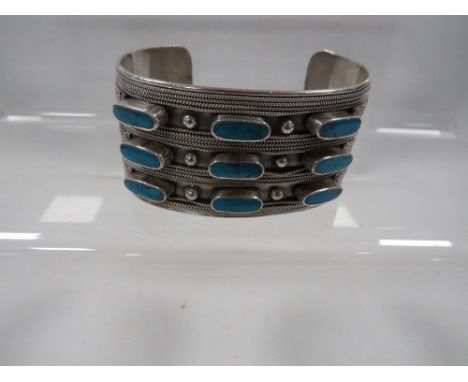 A 925 silver and turquoise cuff bangle