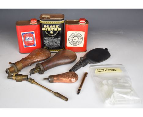 A collection of shooting accessories including powder flasks by M Marsh of Sheffield and Sykes, leather shot flask, percussio