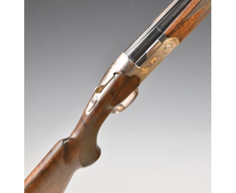 Beretta Ultra Light Deluxe 12 bore over and under ejector shotgun with gold bird engraved locks, named and engraved underside