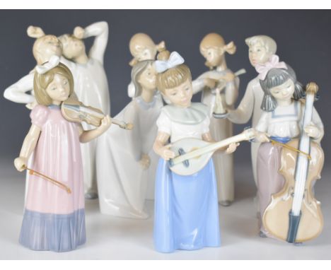 Nine Lladro / Nao figures including five musicians, most boxed, tallest 23cm