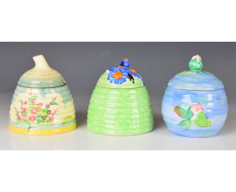 Clarice Cliff for Newport and Wilkinson Pottery three Art Deco honey / preserve pots, tallest 11cm