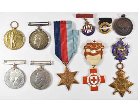 British Army medal trio comprising 194/1915 Star, War Medal and Victory Medal named to 1879 Pte W Wright, Manchester Regiment