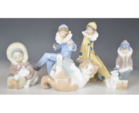 Five Lladro / Nao figures including Inuit and Pierrot, tallest 20cm