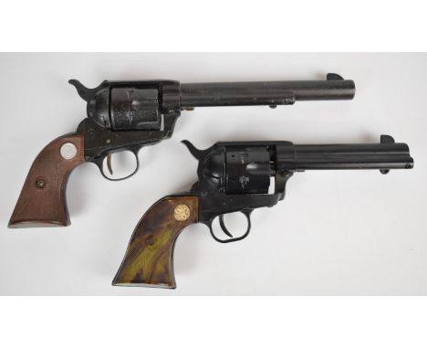 Two Colt style six shot single action revolvers, both with chequered composite grips, Long Knife style with 7 inch barrel and