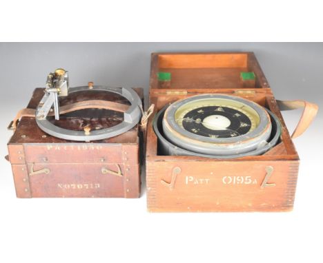 Pattern 0195A naval or similar military compass on gimballed mounts, together with a pattern 1950 azimuth circle, both in ori