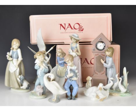 Ten Nao figures including girl with cake, tallest 24cm