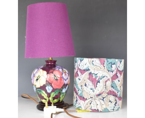 Moorcroft table lamp decorated in the Pansy pattern, with two shades, height 42cm with shade